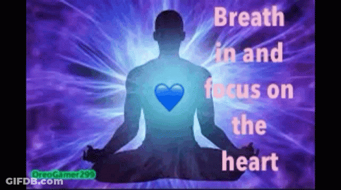 Man In Lotus Position Breath In Focus On Heart GIF