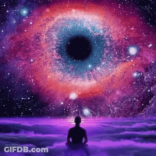 Man In Lotus Position In Front Of Huge Eye In Galaxy GIF