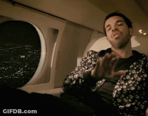 Man In Louis Vuitton Jacket Sitting In Plane GIF