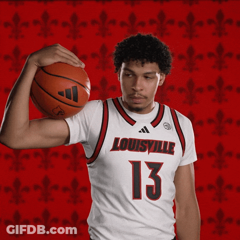 Man In Louisville Jersey Holding Basketball GIF