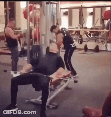 Man In M&Ms Jersey Lifting Weights GIF