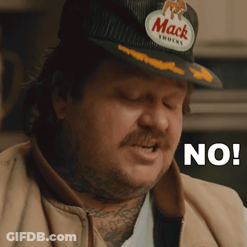Man In Mack Truck Hat Saying No GIF
