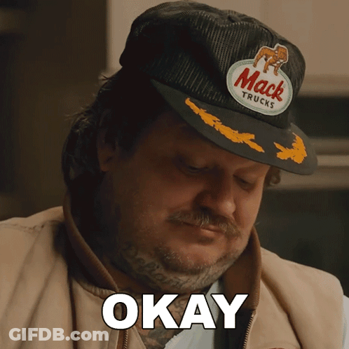 Man In Mack Truck Hat Saying Okay GIF