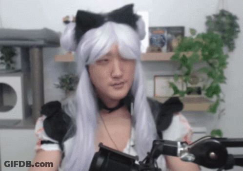 Man In Maid Costume Eyes Closed At Microphone GIF