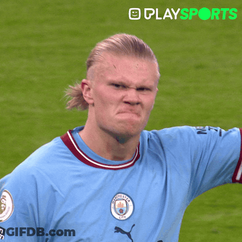 Man In Manchester City Shirt Making Face GIF