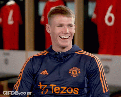 Man In Manchester United Shirt Laughs GIF