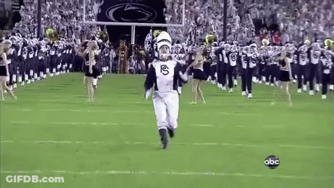 Man In Marching Band Uniform Running On Field GIF