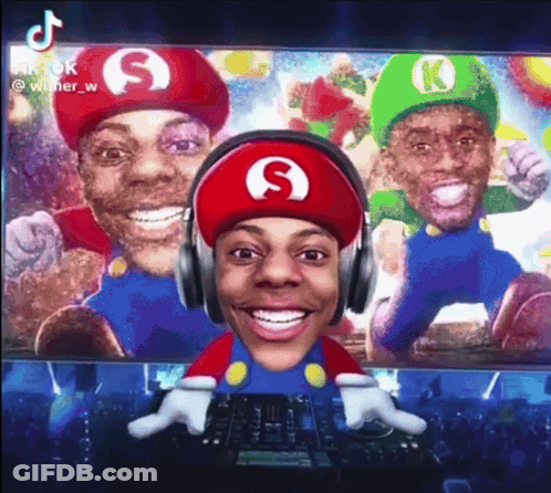 Man In Mario Hat Wearing Headphones Smiling GIF