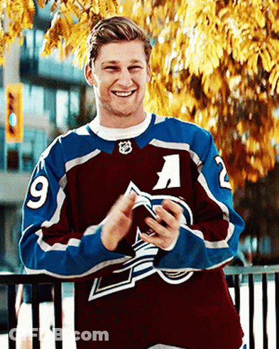 Man In Maroon And Blue Jersey Number 9 GIF