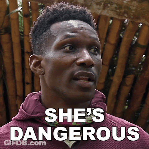 Man In Maroon Hoodie Saying She's Dangerous GIF
