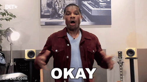 Man In Maroon Jacket Saying Okay GIF