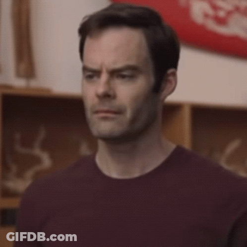 Man In Maroon Shirt Making Funny Face GIF