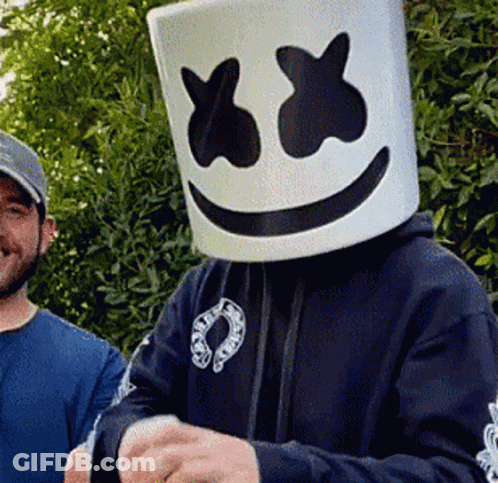 Man In Marshmello Mask Beside Another Man GIF
