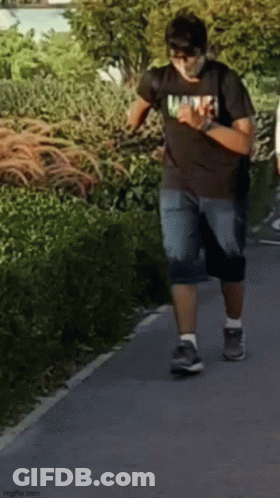 Man In Marvel T-Shirt Walking GIF