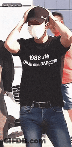 Man In Mask And 1986 T-Shirt GIF