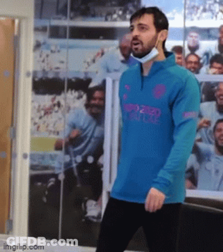 Man In Mask And Blue Shirt Saying Euro 2020 GIF