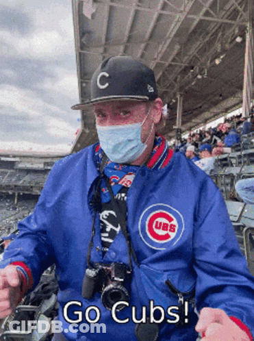 Man In Mask And Cubs Jacket GIF