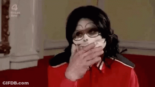Man In Mask And Glasses Covering Mouth GIF