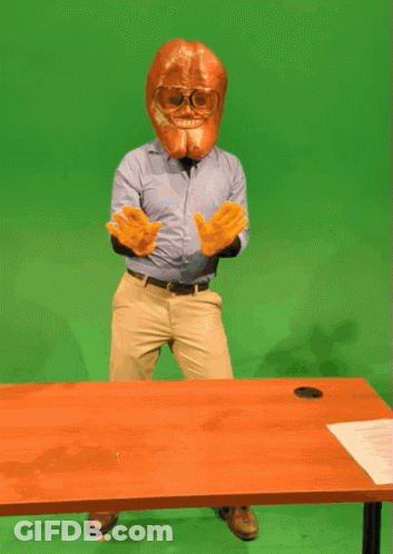 Man In Mask And Gloves At Desk GIF