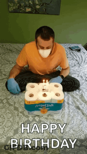 Man In Mask And Gloves Celebrating Birthday With Toilet Paper GIF