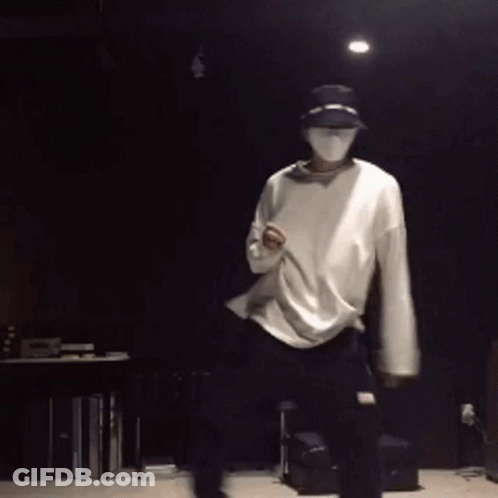 Man In Mask And Hat Dancing GIF