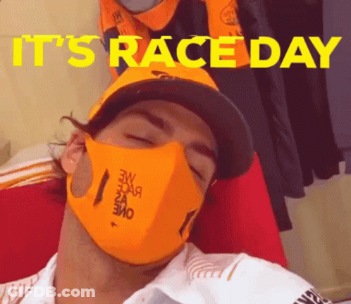 Man In Mask And Hat Says Race Day GIF