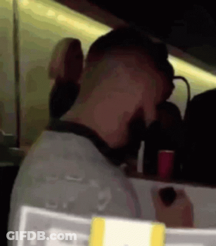 Man In Mask And Sunglasses On Race Track GIF