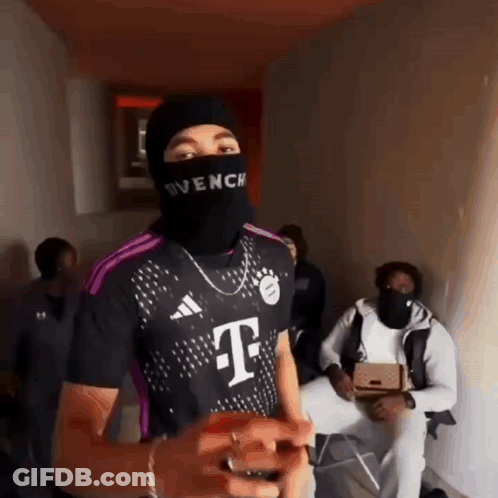 Man In Mask And T-Mobile Shirt GIF