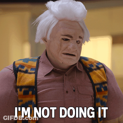 Man In Mask And Vest Saying I'm Not Doing It GIF