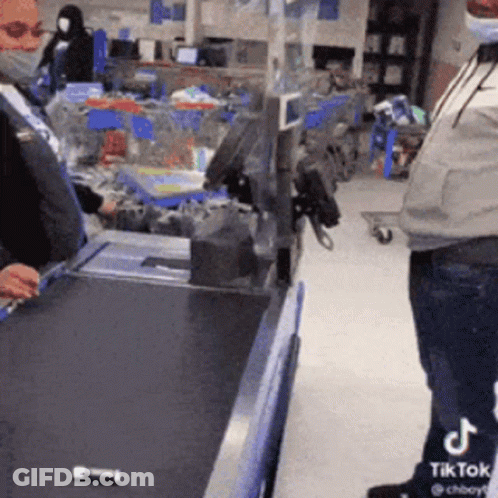 Man In Mask At Grocery Store Cash Register GIF