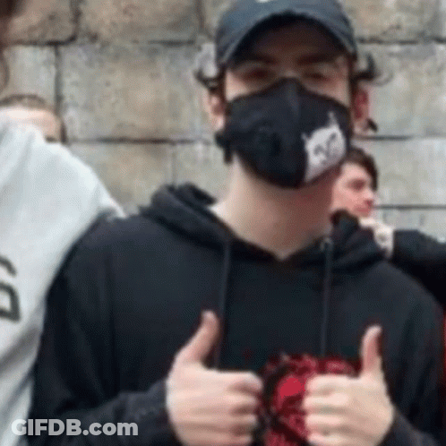 Man In Mask Giving Thumbs Up GIF