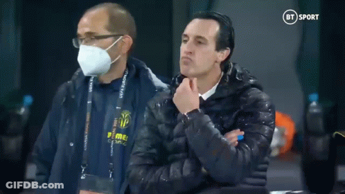 Man In Mask Next To Man In Puma Jacket GIF