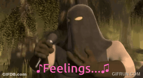 Man In Mask Singing Into Microphone Saying Feelings GIF