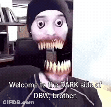 Man In Mask Sitting In Chair Talking GIF