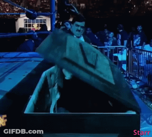 Man In Mask Sitting In Coffin With Word Starr GIF