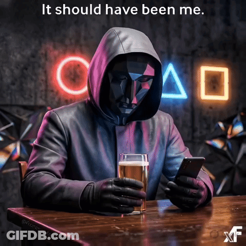 Man In Mask Sitting With Beer And Cell Phone GIF