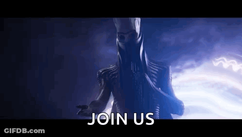 Man In Mask Standing In Dark Saying Join Us GIF
