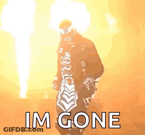 Man In Mask Standing In Front Of Fire Saying Im Gone GIF