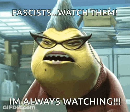 Man In Mask Talking To Woman In White Uniform GIF