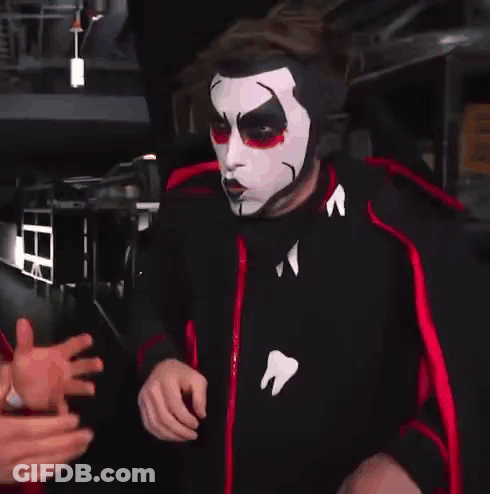 Man In Mask With A And Man In Cape GIF