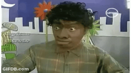Man In Mask With Flower In Hair GIF