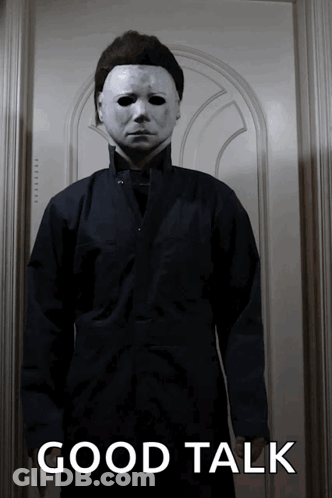 Man In Mask With Good Talk Above GIF