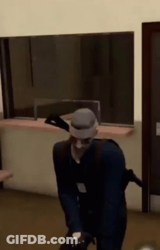 Man In Mask With Gun GIF