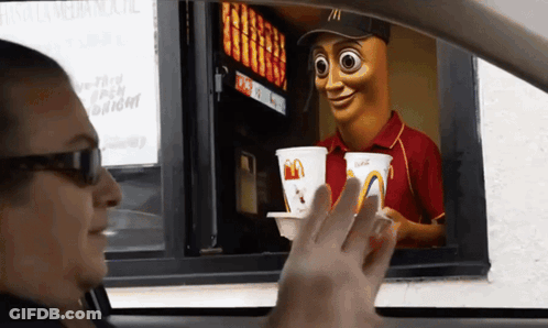 Man In McDonald's Drive Thru Getting Drink GIF