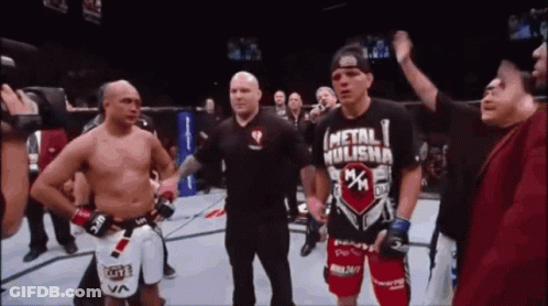 Man In Metal Hulisha Shirt In Ring GIF
