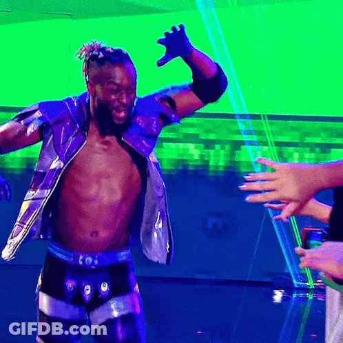 Man In Metallic Outfit Dancing In Front Of Crowd GIF