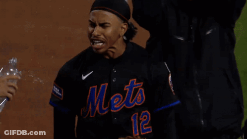 Man In Mets Jersey Holding Water Bottle GIF