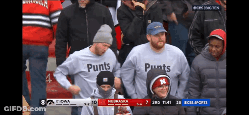Man In Miami Dolphins And Cleveland Browns Jerseys GIF