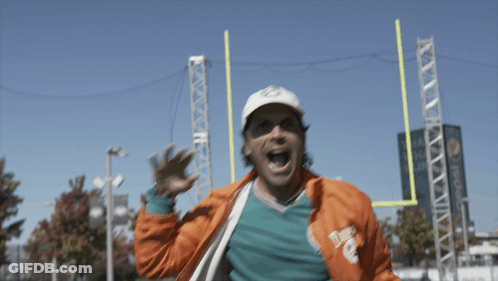 Man In Miami Dolphins Jacket And Hat GIF