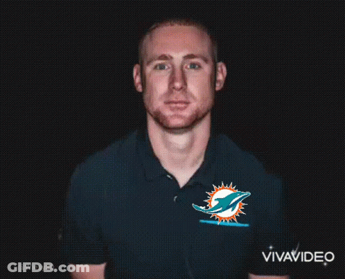 Man In Miami Dolphins Shirt In Dark GIF